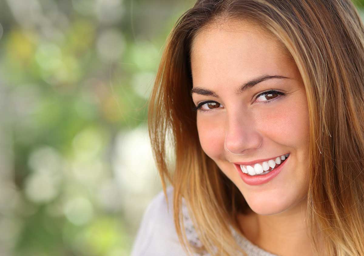 Attractive lady smiling with bright white teeth
